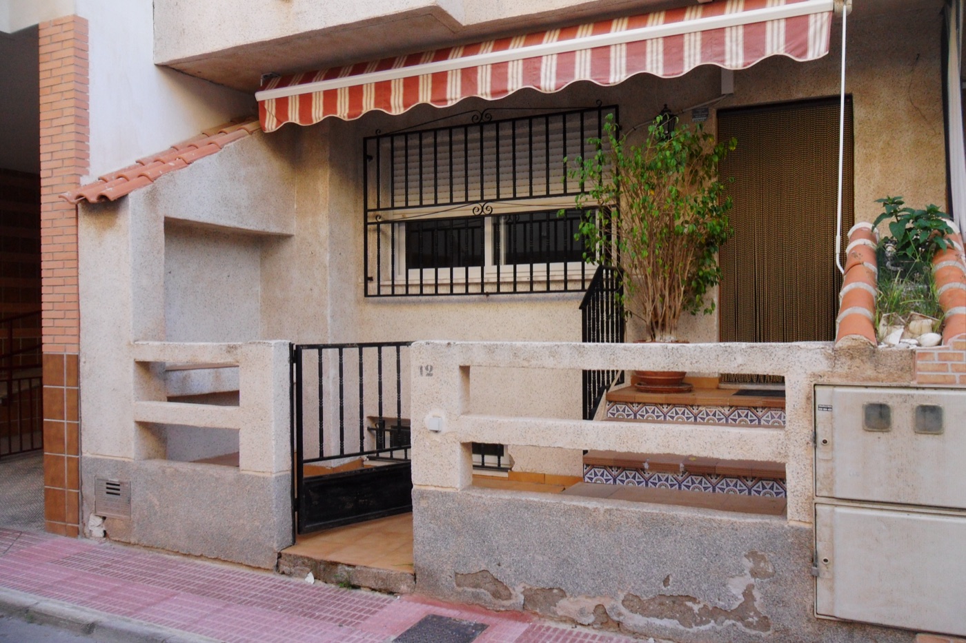 Fachada de vivienda — antes
