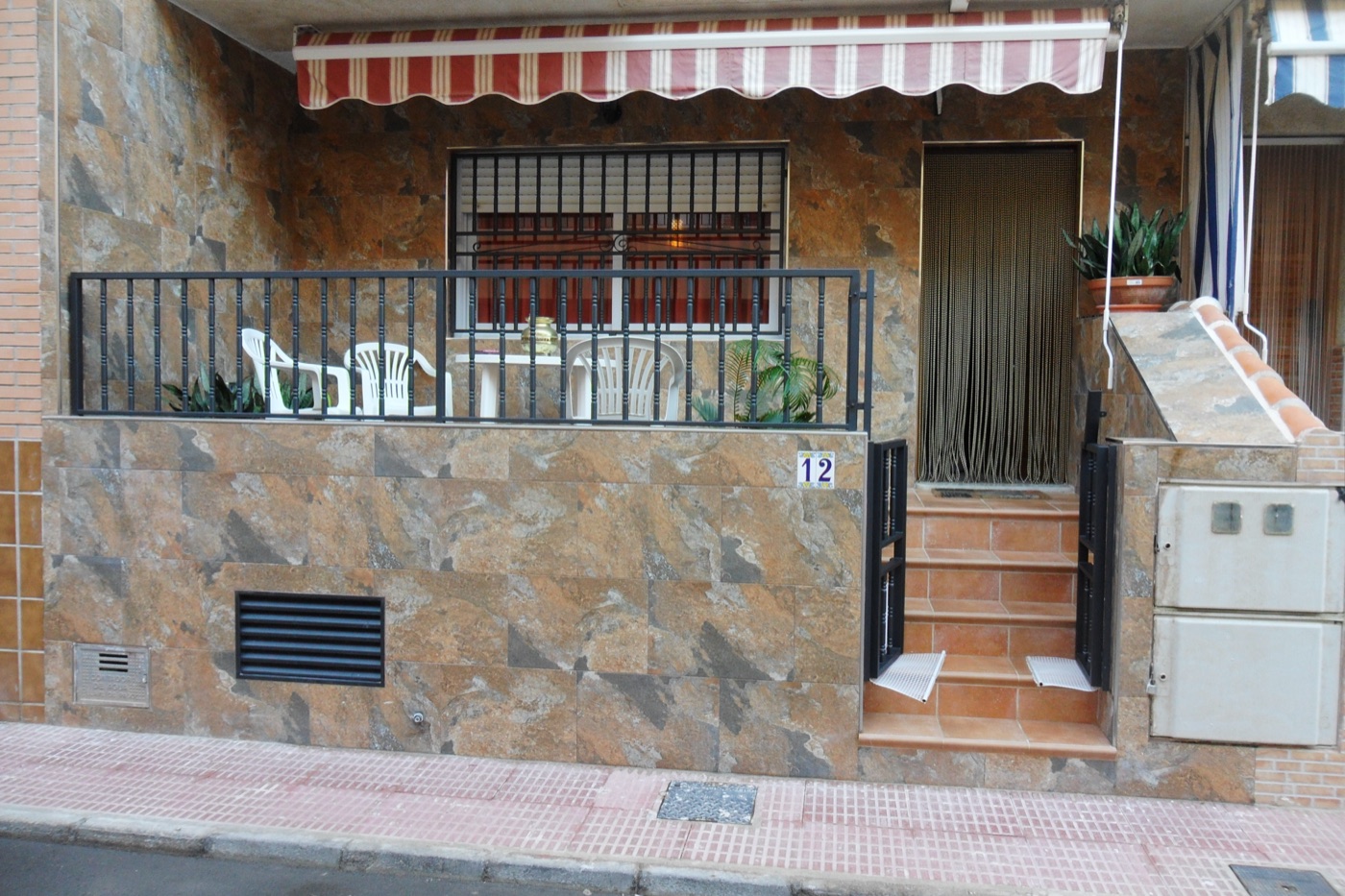 Fachada de vivienda — después